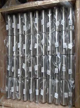 Zinc-plated pins packed in rows in an export crate