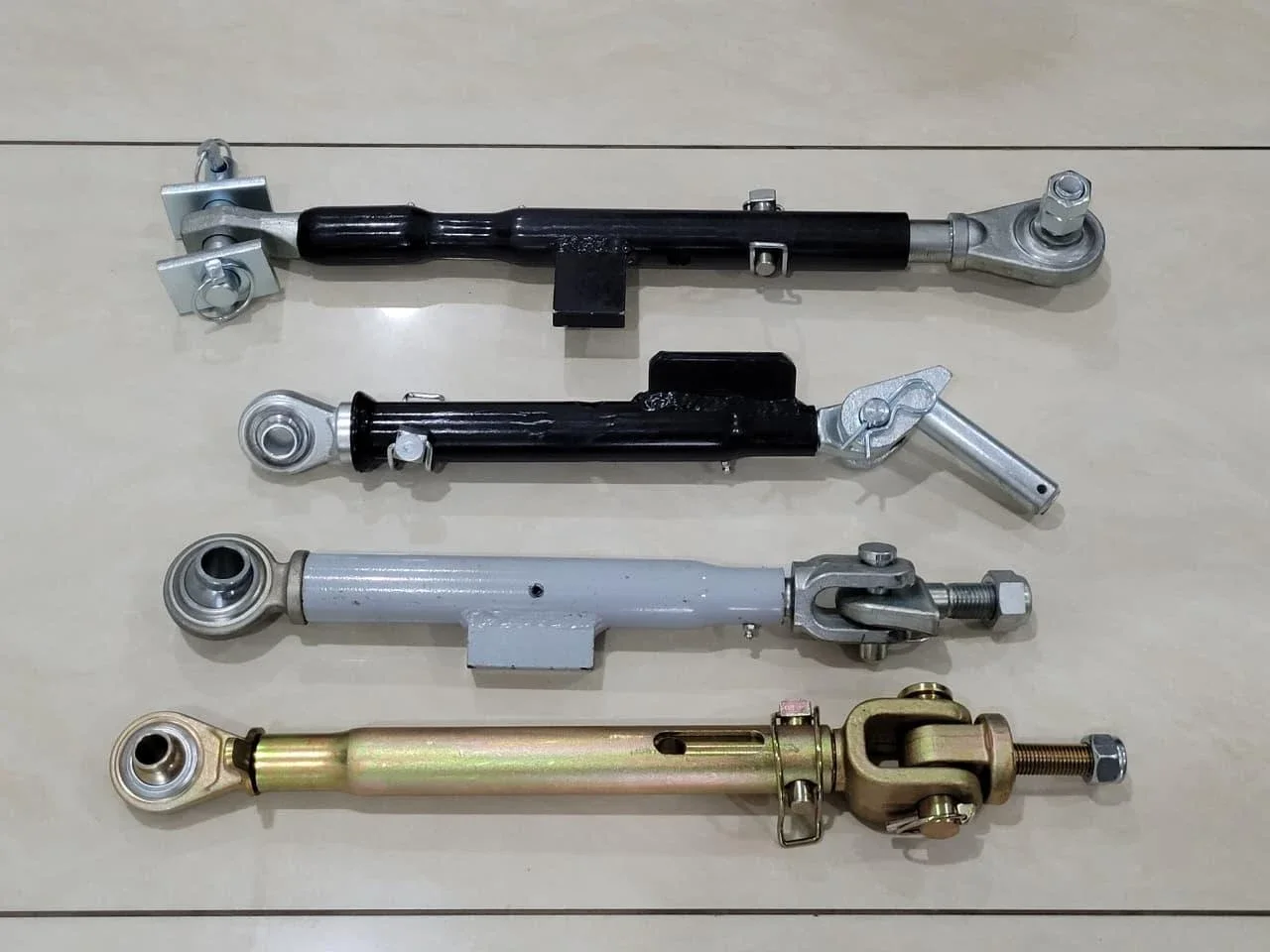 Top links (top link assemblies) with ball joint ends, clevis ends and brackets, painted and yellow zinc plated