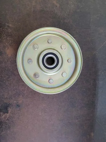 Flat idler pulley with sealed bearing for mowers