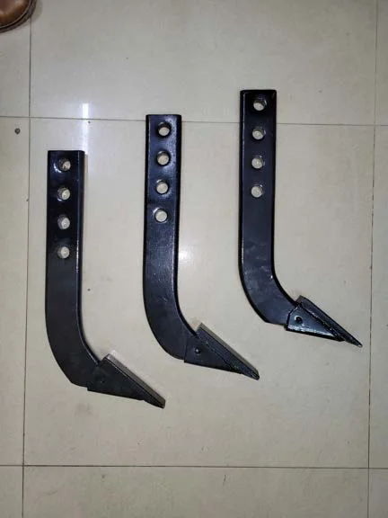Cultivator tines with points